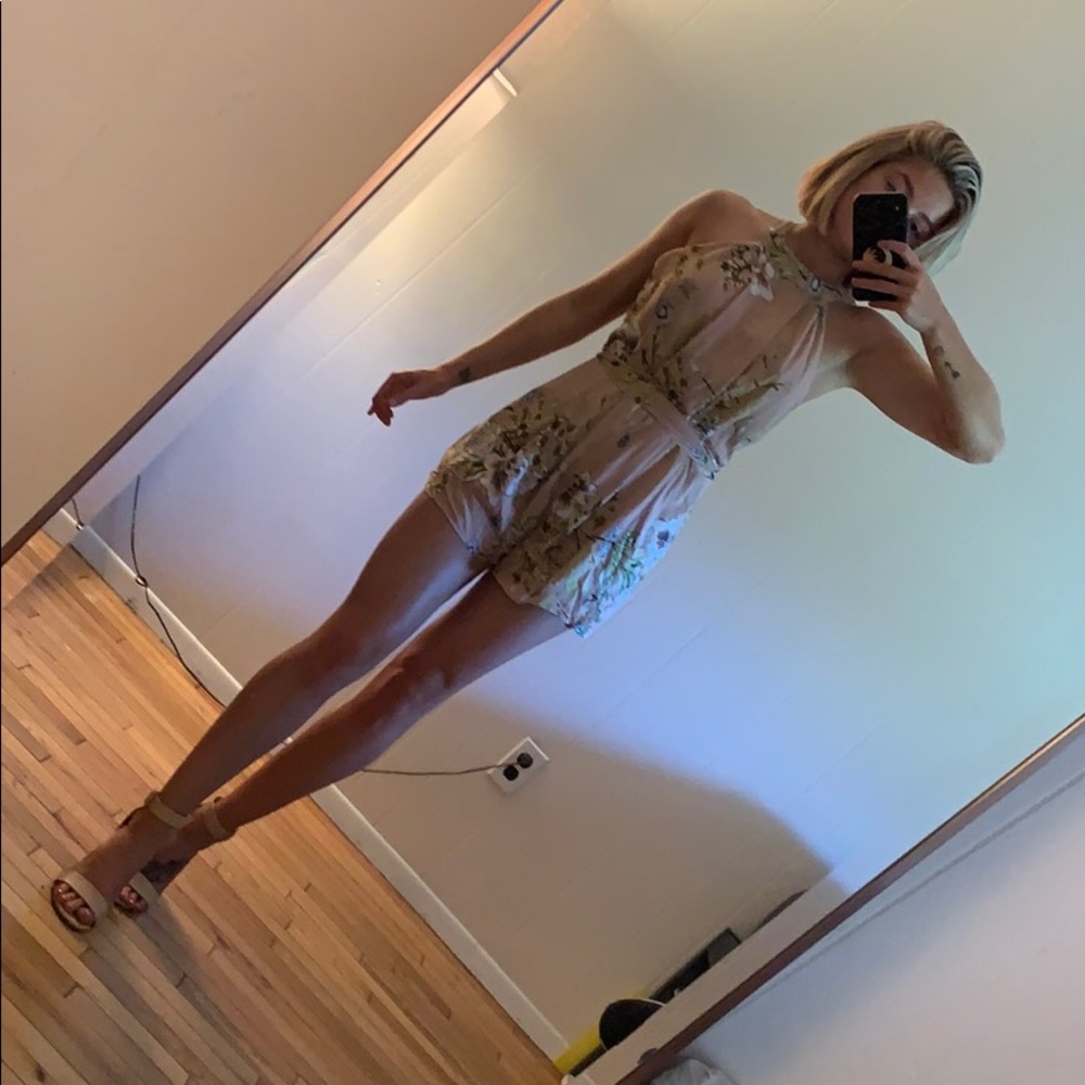 Light pink flowered romper